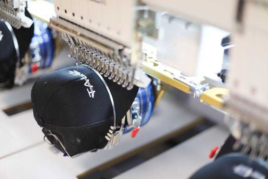 ottawa-embroidery-custom-baseball-snapback-cap-black-on-machine-production