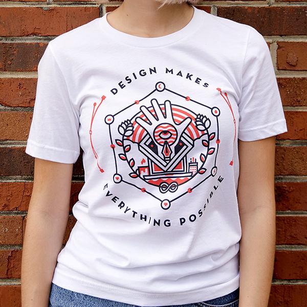 ottawa-custom-t-shirt-printing-screen-printing-shirt-model-woman-wearing-white-printed-shirt-with-red-design-against-a-wall